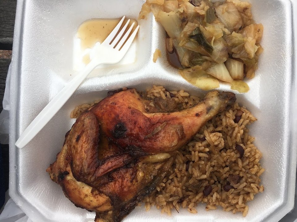 Daily soul-food lunch choices on a wall menu.